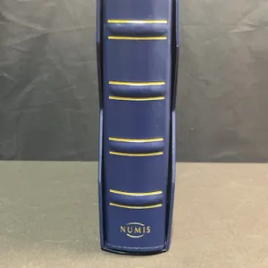 Numis Blue Coin Album With Assorted Canadian Quarters