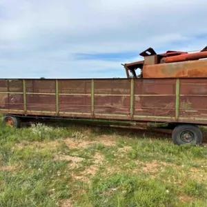 24' TRAILER W/ METAL MESH CAGED SIDES