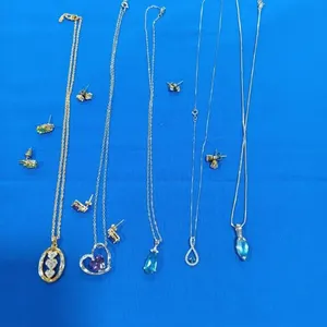 Assortment of Pendant Necklaces  & Earrings.
