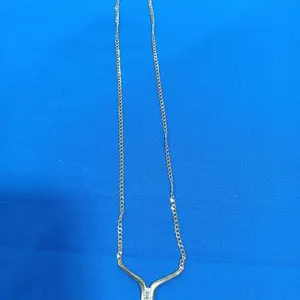Yellow Gold Chevron Style Pendant Necklace.