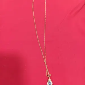 Gold Necklace With Amethyst Pendant. Halo Of
