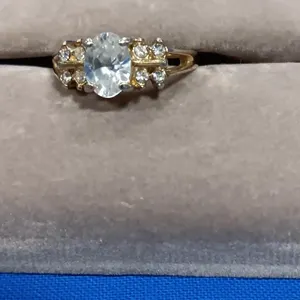 Gold Tone Solitaire Ring. Approx Size 7.5. No
