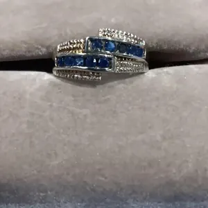 Silver Tone With Blue Sapphire Stone. Approx Size