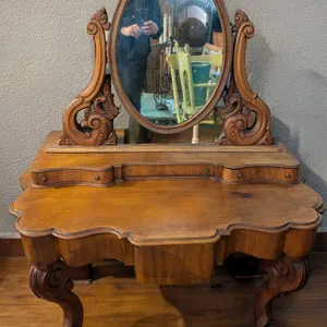Ornately Carved Wood Vanity With Oval Mirror