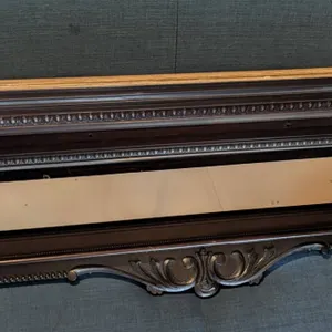Carved Wood Mantel Shelf with Mirror and Ornate Details