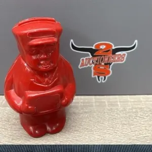 Prairie Plastics Swift Current Mailman Coin Bank.