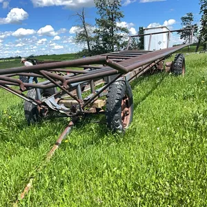 SHOPBUILT RD BALE WAGON/TRAILER MADE FROM A TRUCK FRAME