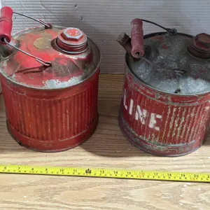 2 antique gas cans