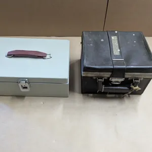 metal cash box with leather cassette tape storage case