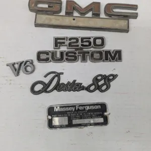Vehicle emblems w/ massey ferguson serial number plate, gmc astro, delta88, f250 and more