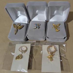 jewelry - gold tone rings and 5 pins, religious