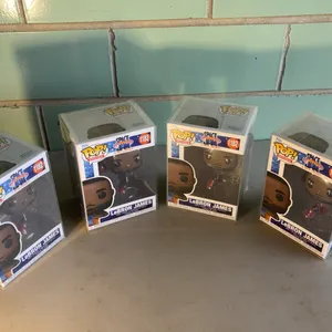 Four LeBron James Space Jam vinyl figures