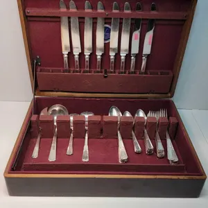 Silver Plate Flatware by Yourex Silverseal. Includes Wooden Case, 8 dinner forks, 8 dessert forks, 11 Teaspoons, 8 Dinner Knives, 6 Serving spoons and
