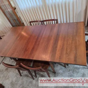Classic Mid Century Modern ~ WILLETT ~ Solid Transitional Cherry Wood Drop Leaf Dining Room Table with 6 chairs and 1 Leaf. The fully extended table m