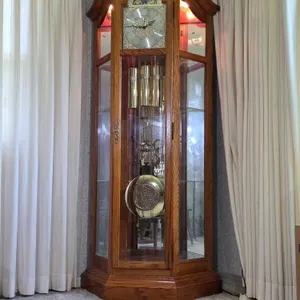 Howard Miller Grandfather Clock. Model 610-845. Chimes every 15 minutes. Has nice clear chime, appears to keep time properly. * you must bring adequat