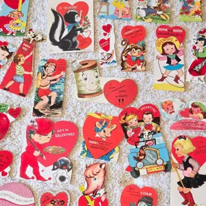 A bunch of Vintage Valentines. All or most have writing on the back. MBR
