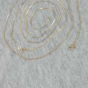 TWO 18" - 14K Gold Chains marked Italy. Both have minor kinks. The Serpentine is 1.1g and the Box Link is 2g. Total of 3.1g. OB