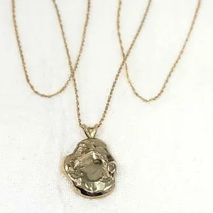 Heavy 7.9g Melted Gold Nugget acid tested to 22K on a 16" chain in 14K gold weighing 1.1g. OB