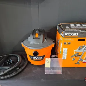 New Open Box Rigid 9 Gal. 4.25 Peak HP NXT Shop Vacuum Wet Dry Vac with General Debris Filter, Locking Hose and Attachments Model # HD0900