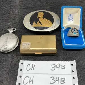 Ring in Box, Paris Pocket Watch, Pelican Belt Buckle, & Pens & Cartridges in Case