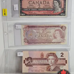 Canada $2 Bills (3) : - 1954 Beattie/Rasminsky #SU3468044 - 1974 Lawson/Bouey #BV3462274 - 1986 Thie