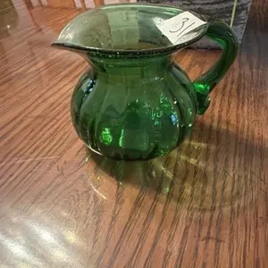 Green compression pressed glass