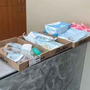 Tray of Accutron ClearView Nasal Masks, Henry Schein Syringes and Dental Hoses