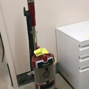 Shark Anti-Allergen Lift-Away upright vacuum cleaner. Features red and silver-tone finish, PowerFins brush head, detachable Lift-Away canister, clear 