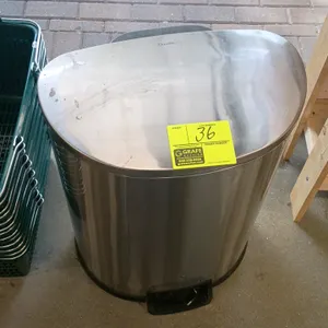 Qualiazero stainless steel step trash can. Features a semi-round flat-back design, foot pedal operated flip-up lid, and a removable black plastic inne