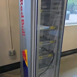 2023 GDC RB-SMC 130 ECO 1-door glass door beverage cooler. Features self-contained refrigeration, branded Red Bull graphics, and adjustable wire shelv