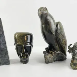 4 Carved Stone Sculptures: Pyramid, Mask, Buffalo, Hawk