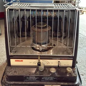 Toyoset Sunglow Kerosene Heater. Part Full of