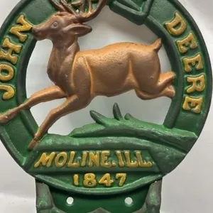 Large Cast Iron John Deere Match Holder