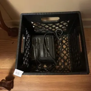 Plastic crate with battery charger ever start 6