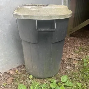 Plastic trash can 28inx21in with lid