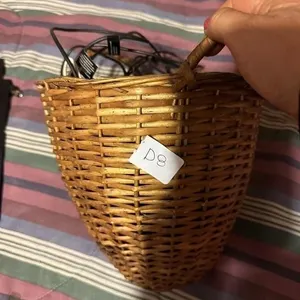 Basket with misc chargers and flip phones