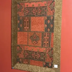 red and gold patchwork tapestry with oriental