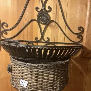Wall decor basket with a camo hat
