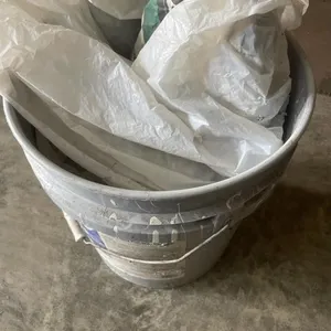 Plastic bucket with quick Crete