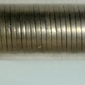 Roll of Jefferson Nickels from 1946, 1948, 1949, and 1951 in Plastic Tube