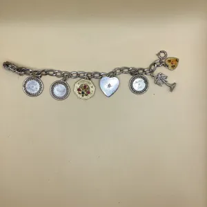 Sterling Silver Charm Bracelet with Assorted Vintage Charms