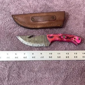 Damascus steel knife with gut hook