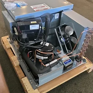 2026 True REFDECK-L-2 condensing unit with compressor. Features FMFT415U compressor, condenser coil, and fan. Designed for commercial freezer units. R