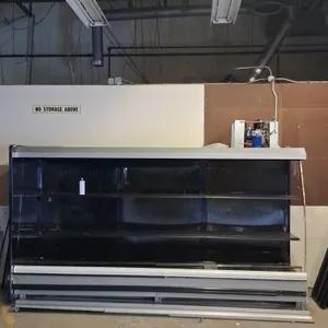 Kysor Warren DX6 PTD 6 refrigerated multideck display case. Features multi-deck shelving and black interior. Designed for R404A refrigerant. Measures 