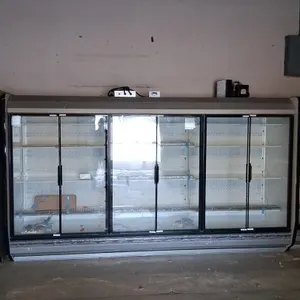 2025 Hussmann IDDF5SU12 6-door medium-temp glass door display case lineup. Features adjustable shelving and top-mounted compressor. Refrigerant: R448A