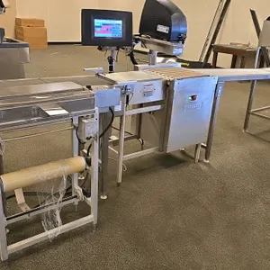 Hobart W32-6, SP-5, and EPCP-5i wrapper and automatic labeler system. Features touchscreen controls, adjustable temperature, and sensor-driven automat