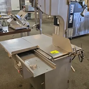 Biro 3334 commercial meat saw. Features stainless steel construction, a sliding meat carriage, and an adjustable thickness gauge. Equipped with push-b