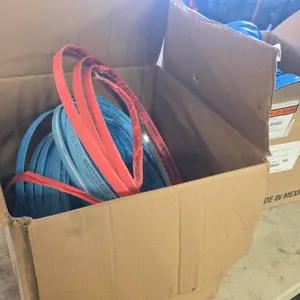 One lot of Kasco SharpTech meat band saw blades. Features protective blue and orange safety wrappers. Safety wrappers are printed with '126 K3H' and '