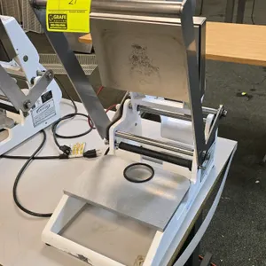 2018 Oliver 1308N food tray sealer. Features a manual lever-operated design, heated sealing plate, and tabletop footprint. Made in the USA. S/N: 18518