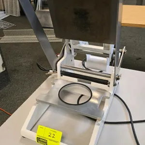 2017 Oliver 1308N food tray sealer. Features manual lever operation and a single-cavity round tray die. S/N: J72644201. Electrical: 120V, 60Hz, 3.2A, 